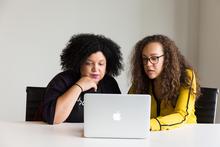 staff members attending a meeting