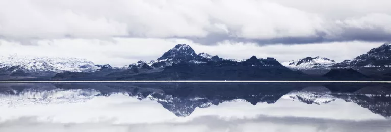 mountains reflecting on a lake